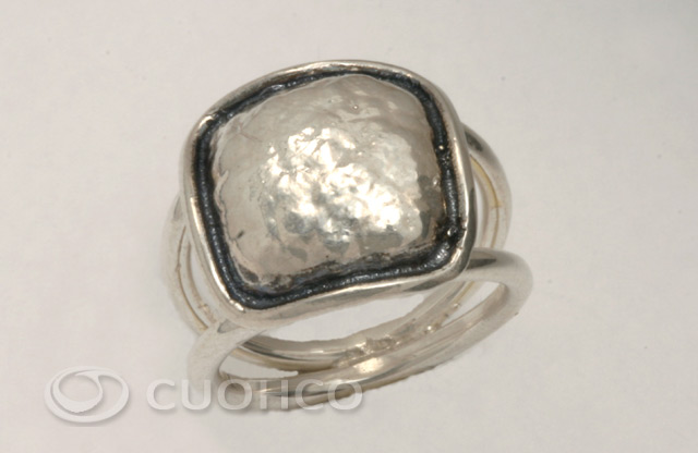 Sterling silver ring of square motif with hammered texture