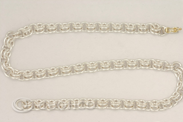 Solid sterling silver chain of round and double oval links with 18-carat gold clasp