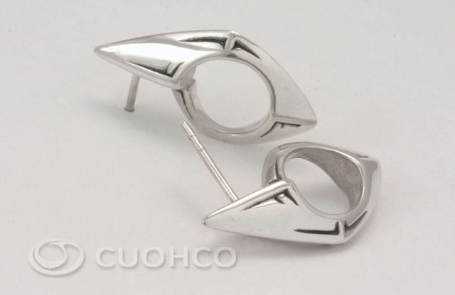 Sterling silver stud earrings with front volume that evoke an African mask